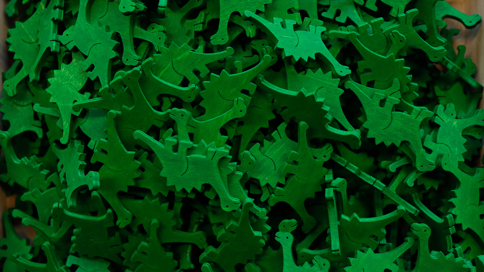 Button Dinosaurier grün
